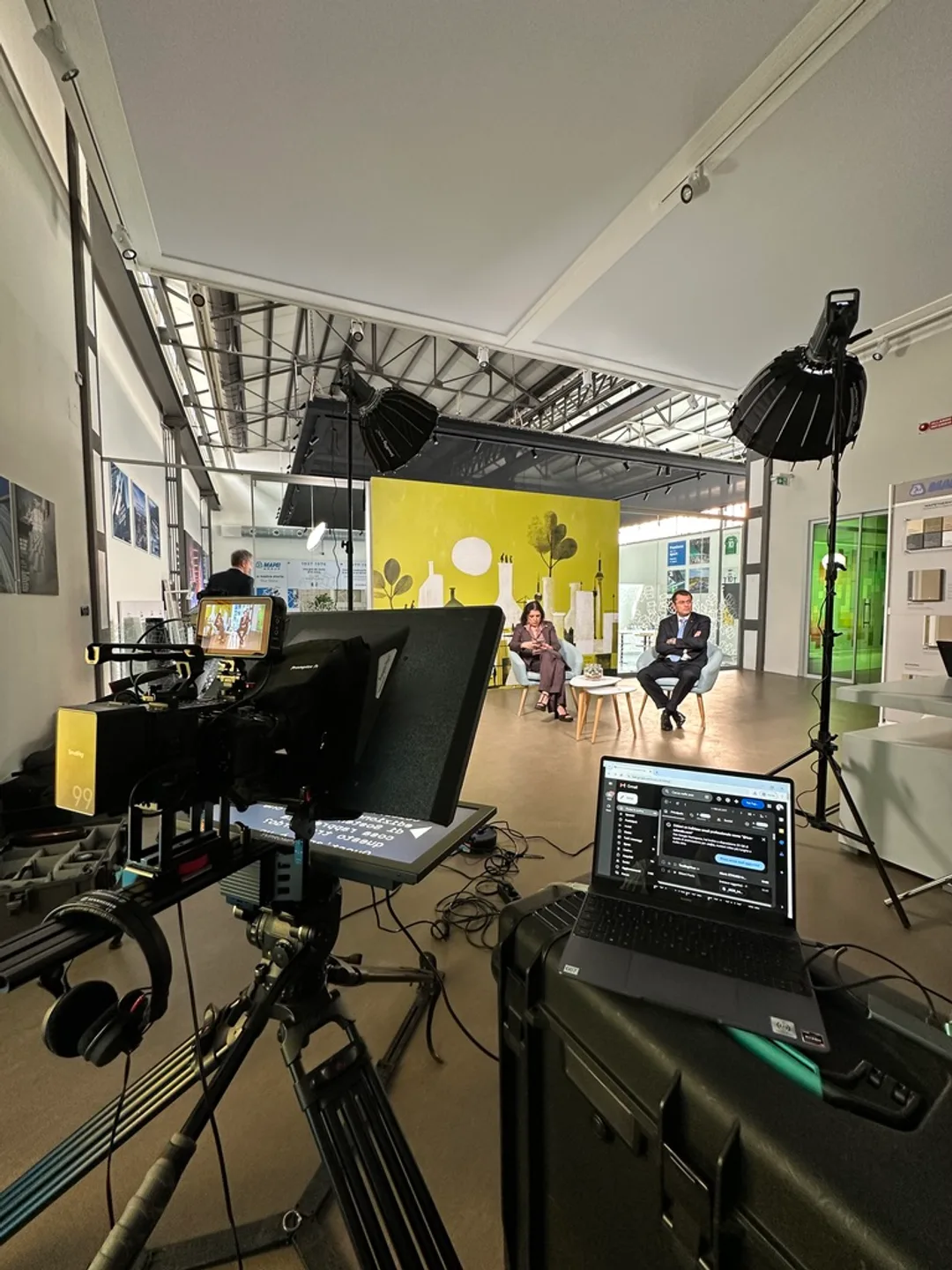 Behind the scenes: the full crew setup filming both interview subjects on set